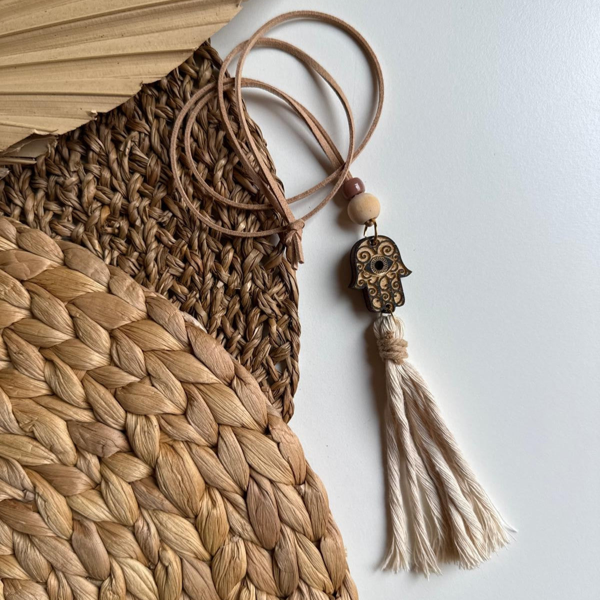Collana con simbolo di protezione 🪬